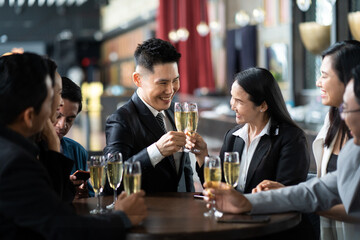 Group Of Asian Friends Enjoying Evening Drinks in bar. Celebration, Party People Christmas and...