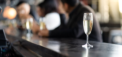 Group Of Asian Friends Enjoying Evening Drinks in bar. Celebration, Party People Christmas and Happy new year concept. Asian business people in party.