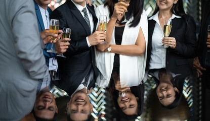 Group of friends Hands Hold Beverage Beers Bottle and toasting in the club. Celebration, Party People Christmas and Happy new year concept. Asian business people in party.
