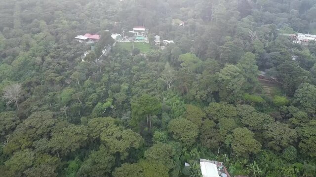 Drone Flying Towards Finca San Cristobal Restaurant Near El Boqueron National Park In  El Salvador - aerial