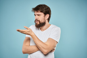 Bearded man emotions white t-shirt lifestyle gestures with hands blue backgrounds