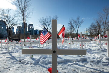 Calgary, Alberta November 11, 2020 - Thousands of crosses lined up row by row along Memorial Drive to commemorate the fallen Canadian soldiers that died in battle, located in Calgary, Alberta, Canada.