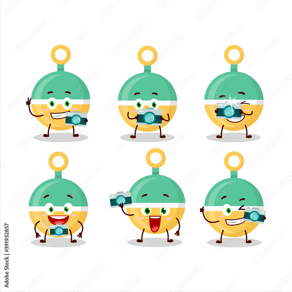 Wall mural Photographer profession emoticon with rattle cartoon character