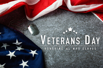 America United States flag and chain dog tags, military symbolizing, studio shot on concrete board...