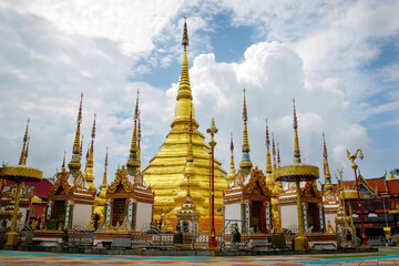 Image of golden pagoda is located in the temple in bantak District. Buddhist temple in Thailand.