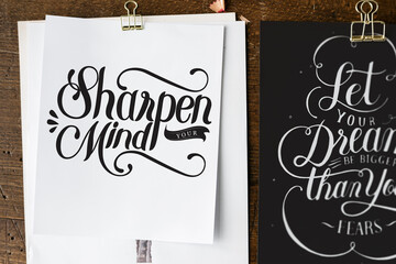 Fototapeta na wymiar Hand lettering of motivation quote on sketch sheets