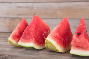 A few slices of fresh watermelon on the table