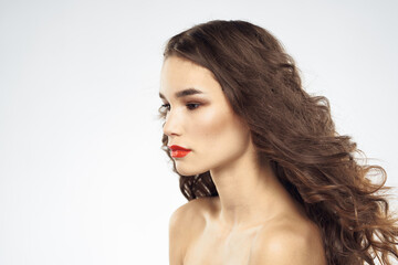 Fototapeta premium Elegant woman with bare shoulders red lips glamor attractive look cropped look