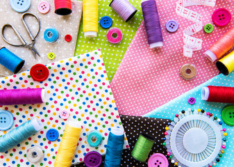 Fototapeta na wymiar Sewing accessories and fabric. Top view, flat lay.