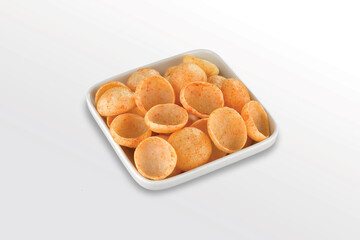Crispy and crunchy Salty wheat cup & Katori, vatka, moon chips, vatki, fryums or frymus, snack food, Indian Pouch Packing Street Food, selective focus - Image