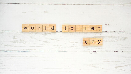 World Toilet Day.words from wooden cubes with letters photo