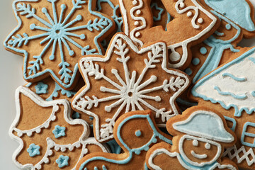 Fototapeta na wymiar Tasty Christmas cookie on whole background, close up