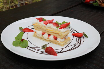 Strawberry Mille Feuille cake in white plate