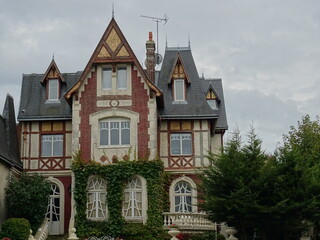 Typical old stone and brick estate in Normandy, France
