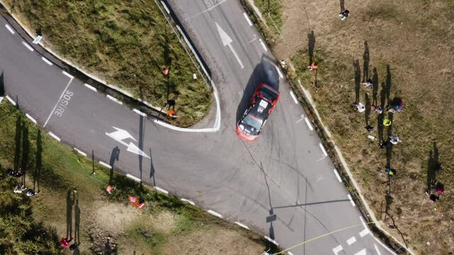 Cluj/ Romania - September 2020: Aerial shot of a sports car race. Transylvania Rally finish line tight curve