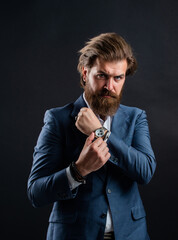 male accessory. serious bearded businessman. stylish mature man looking modern. mens office wardrobe. fashionable man wear hand watch. formal fashion model. handsome man on gray background