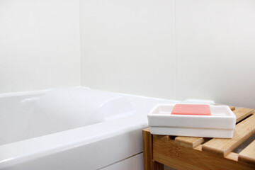 Fototapeta na wymiar soap placed in a bathroom on a white wall