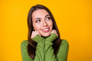 Close-up portrait of attractive creative smart cheerful girl overthinking creating guess isolated over bright yellow color background