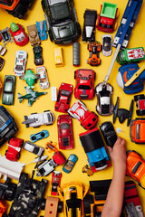 lots of baby toy cars for developing boy games in the background