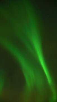 Aurora Borealis Northern Lights seen on a cold winter day in Narvik, Norway.