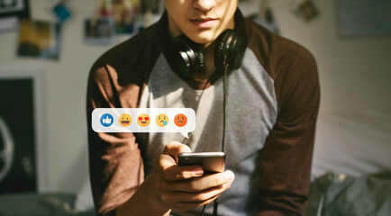 Teen using emojis