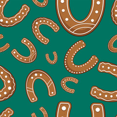 Seamless pattern with gingerbread cookies horseshoes. Green background. Vector illustration.
