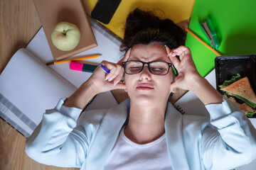 
Young girl working at home online and trying to come up with a creative idea