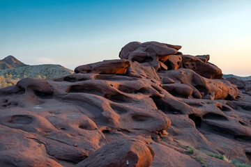 Katutau mountains volcanic rock formations in Altyn-Emel national park in Kazakhstan. Rock formations with interesting shapes. Frozen lava stones.