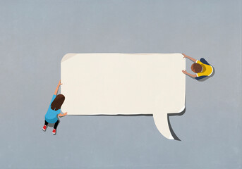 Boy and girl at edge of blank speech bubble
