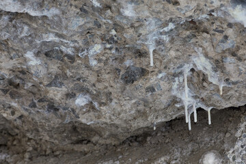 Stalactites in a man-made cave and stone texture for design.