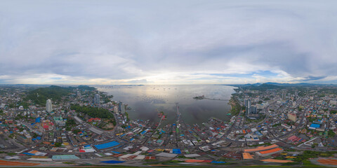 360 panorama by 180 degrees angle seamless panorama of aerial view of residential buildings in Sri Racha district with sea, Chonburi skyline, Thailand. Urban city in Asia. Architecture landscape.