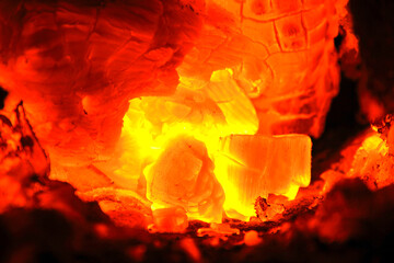 Hot red and orange flame in a stove.