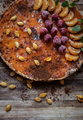 
Homemade pumpkin pie on different backgrounds.