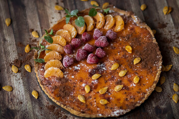 
Homemade pumpkin pie on different backgrounds.