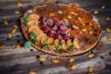 
Homemade pumpkin pie on different backgrounds.