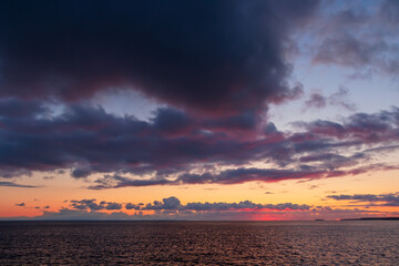 Beautiful sunset seascape. Sea view and clouds at sunset. Great for background.