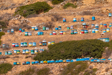 Colorful beehives on the mountainside, Ios, Greece.