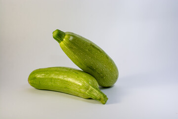 Fresh zucchini, on white background close up shoot