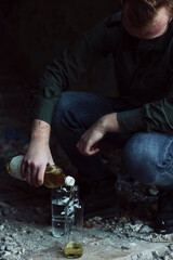 Young soldier mix ingredients to make molotov cocktail