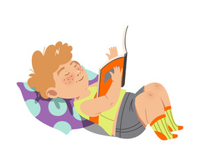 Interested Boy Character Lying on Pillow with Open Book and Reading Vector Illustration