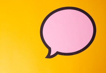 paper speech bubble on yellow background