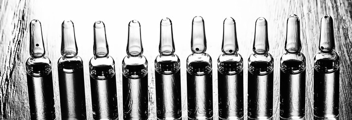 ampoules medicine vaccine concept, abstract background, vaccination virus protection