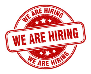 we are hiring stamp. we are hiring label. round grunge sign