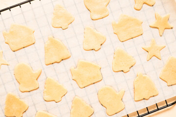 Close-up of raw christmas gingerbread cookies on wooden background