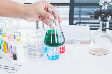 A solution in glassware in the science laboratory.