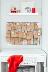 Christmas advent calendar. Gifr paper bags with presents for kid's. Holiday decoration