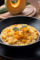 Piatto di delizioso risotto con taleggio e zucca, Cucina Italiana