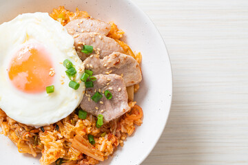 Kimchi fried rice with fried egg and pork