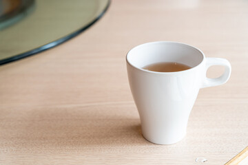 hot tea cup on table