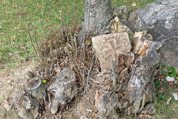Cross Stone in Stump